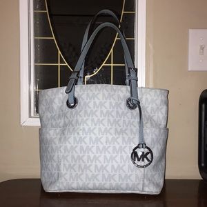 Michael Kors baby blue monogram purse-  Used